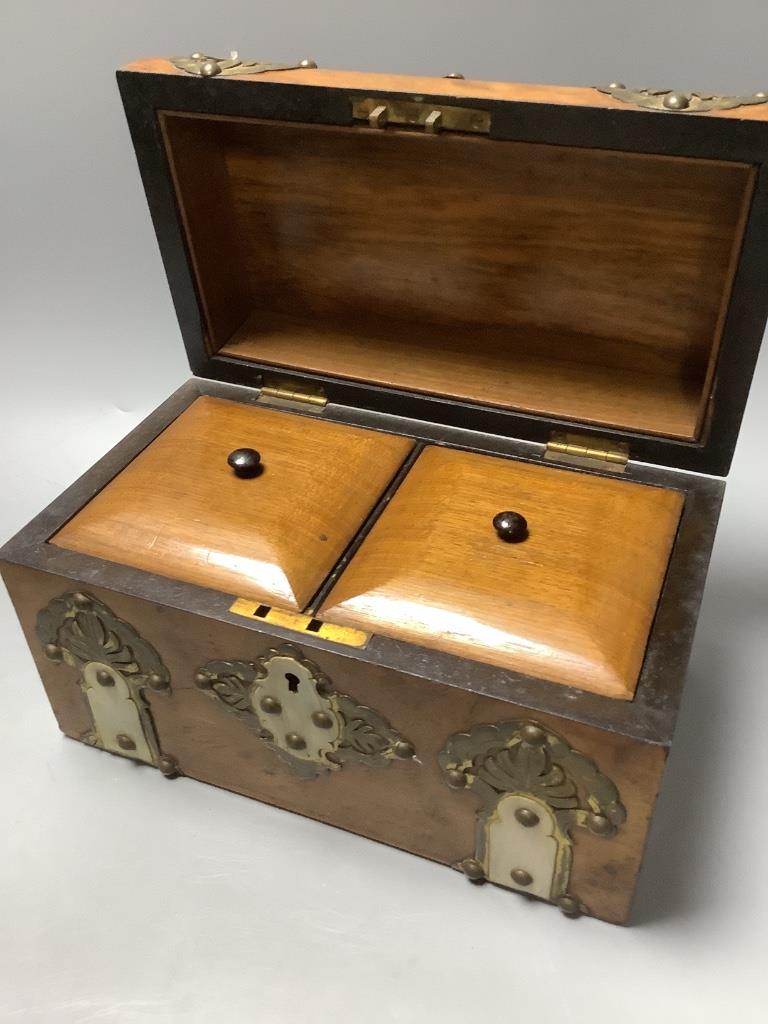 A tortoiseshell and ormolu jewellery casket, modelled in the form of a French commode and a Victorian brass-mounted walnut tea caddy, largest 31cm